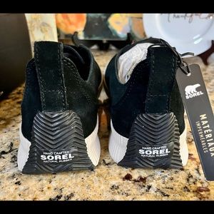 Brand new, never worn Sorel Out N About Plus Slip Ons in black, size 10